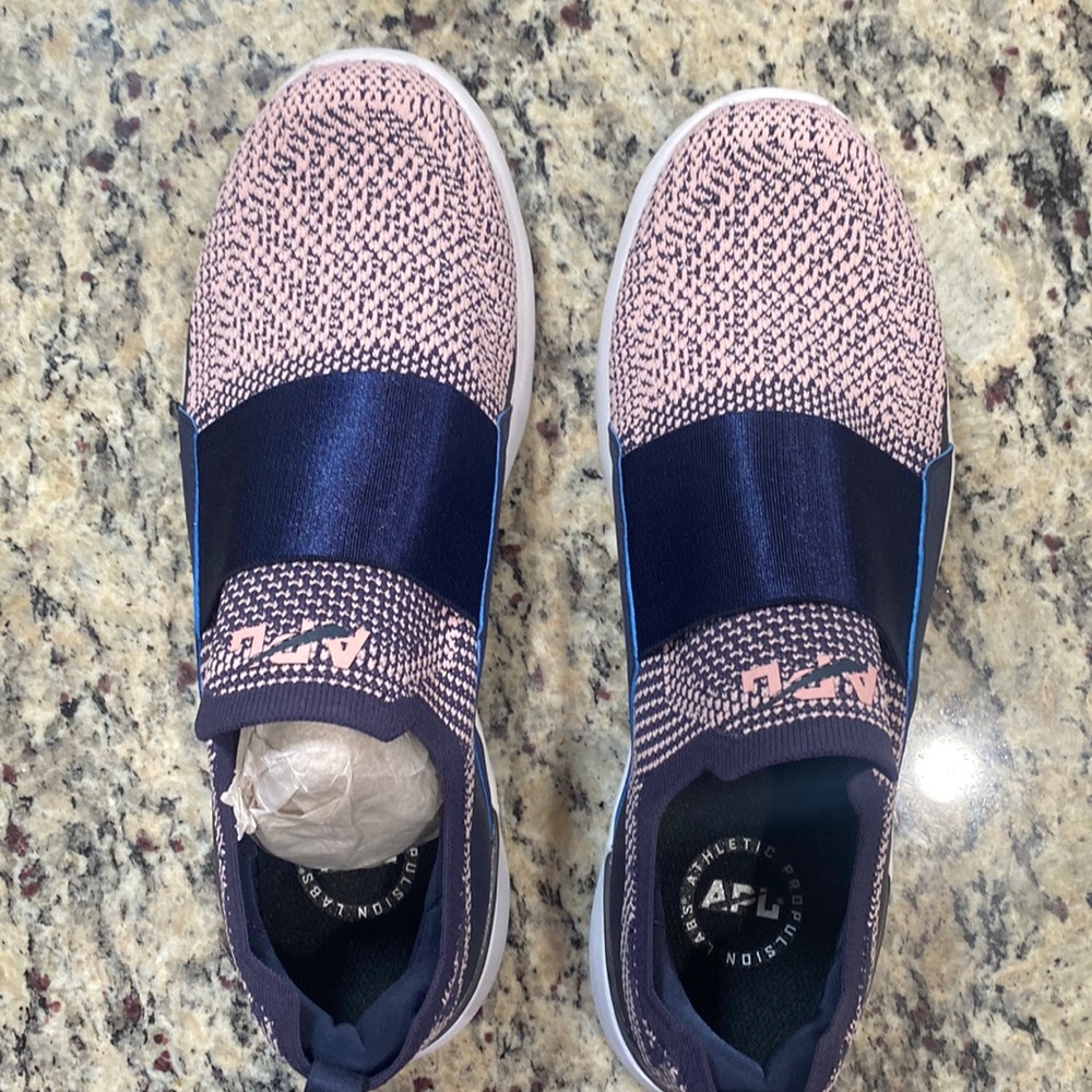 APL pinkish/purpleish and navy blue slip on Techloom bliss sneaker.
